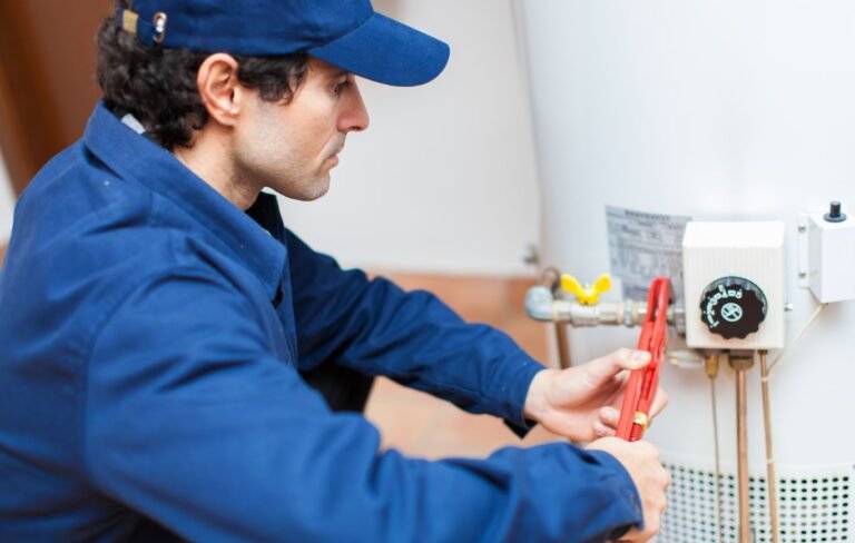 Einstein pros plumber fixing water heater